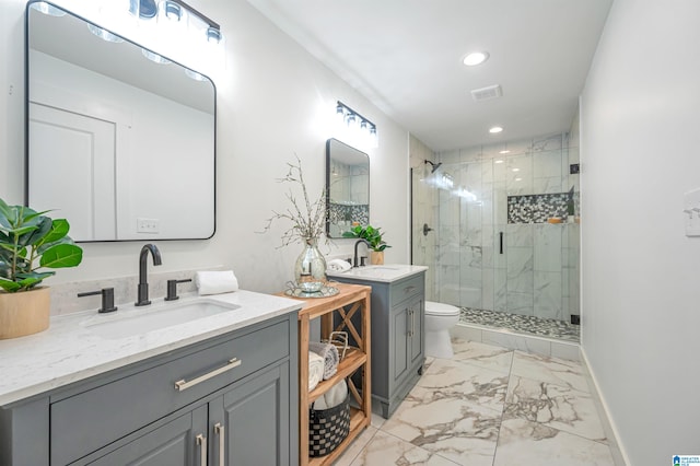 bathroom with tile patterned flooring, toilet, dual bowl vanity, and an enclosed shower