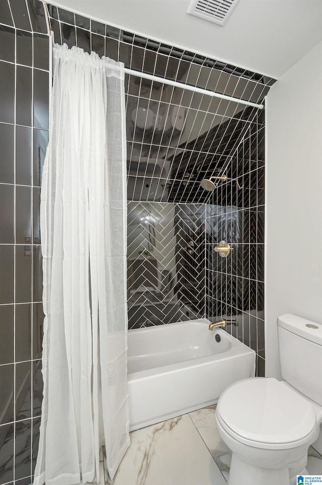 bathroom featuring toilet, shower / tub combo with curtain, and tile patterned floors