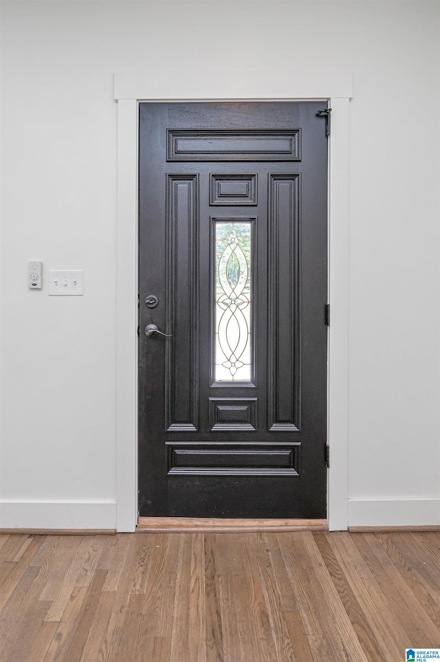 details with wood-type flooring