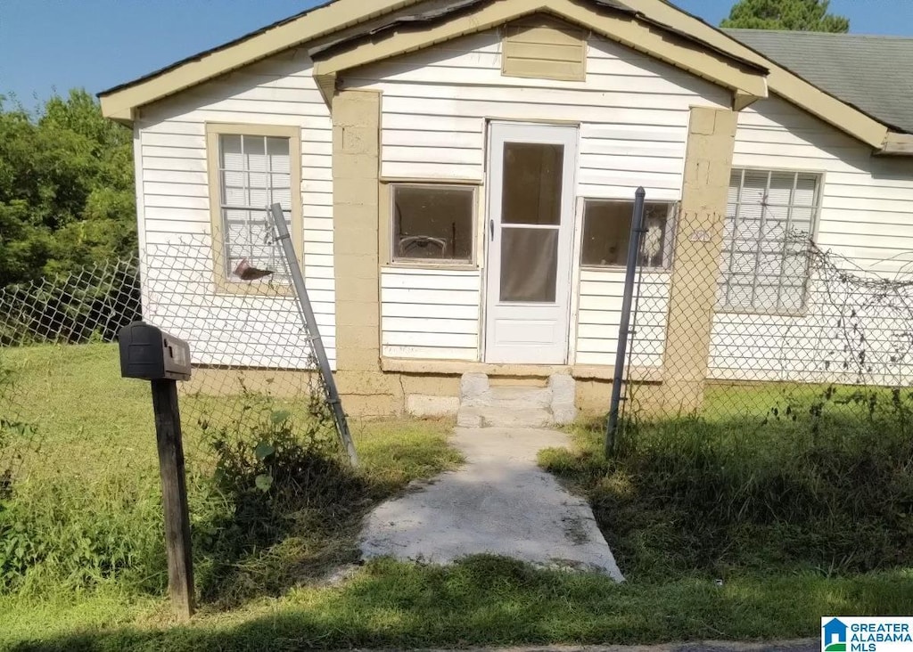 200 Cordova Ave, Birmingham, AL 35214 - doorway to property featuring fence