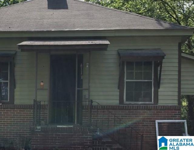411 6th St, Docena, AL 35060 - exterior space with brick siding