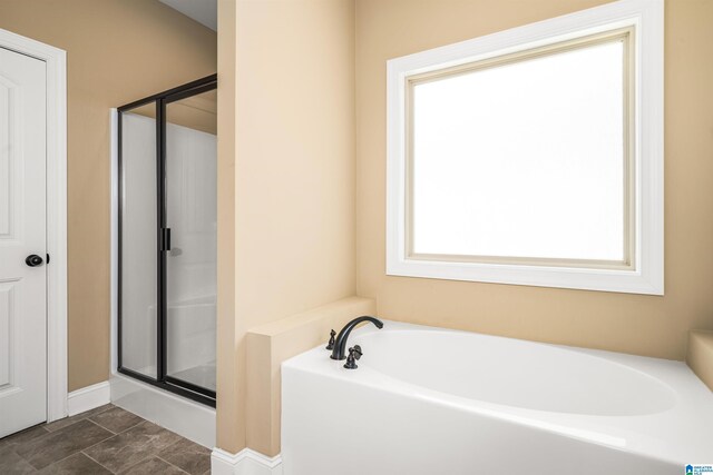 bathroom with vanity and a shower with door