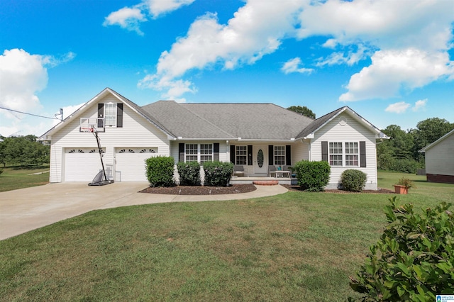 view of front of home with a front yard, a garage, and covered porch