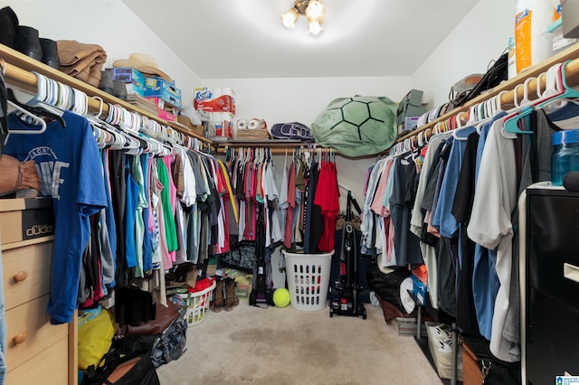 spacious closet with carpet floors