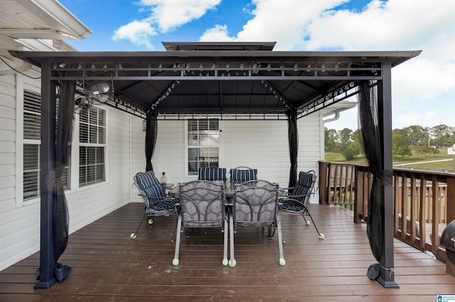 wooden deck with a gazebo