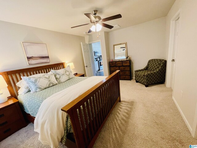 bathroom featuring hardwood / wood-style floors, vanity, toilet, and a shower with door