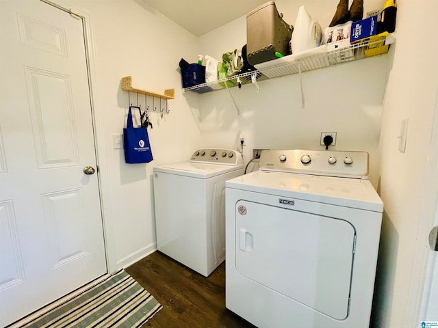 laundry area featuring independent washer and dryer and dark wood-type flooring