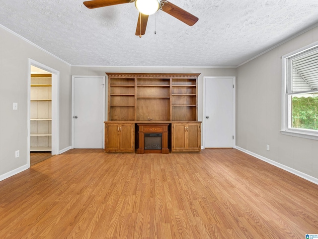 unfurnished living room with light hardwood / wood-style flooring, a textured ceiling, and ceiling fan