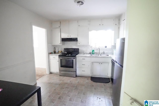 kitchen featuring white cabinetry, stainless steel appliances, and sink