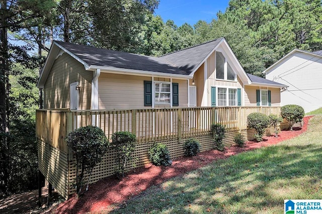 view of home's exterior with a lawn