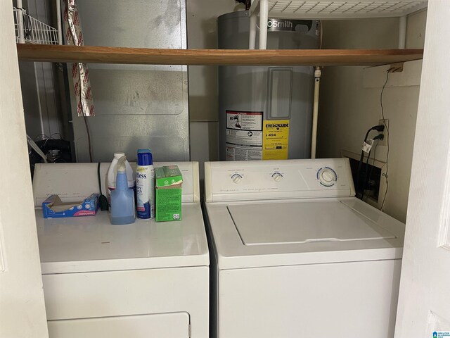 clothes washing area with independent washer and dryer and water heater