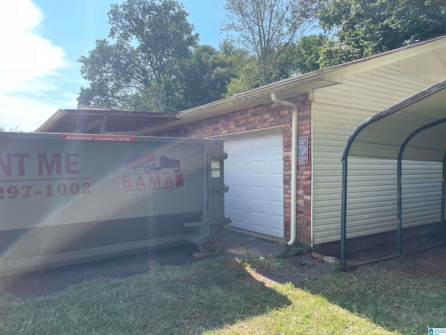 view of side of home with a garage