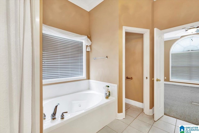 bathroom featuring a bath and tile patterned floors