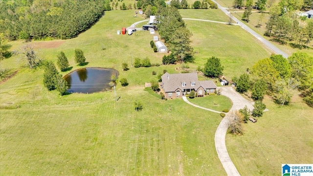 drone / aerial view with a water view and a rural view