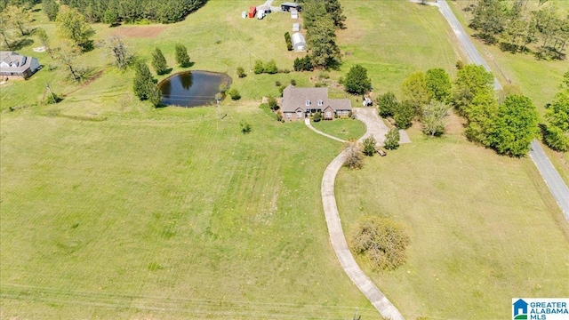 aerial view with a water view and a rural view