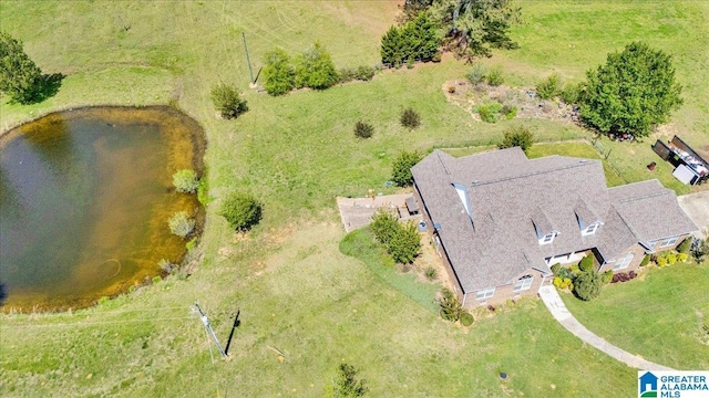 bird's eye view with a water view and a rural view