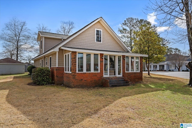 view of front of property with a front lawn