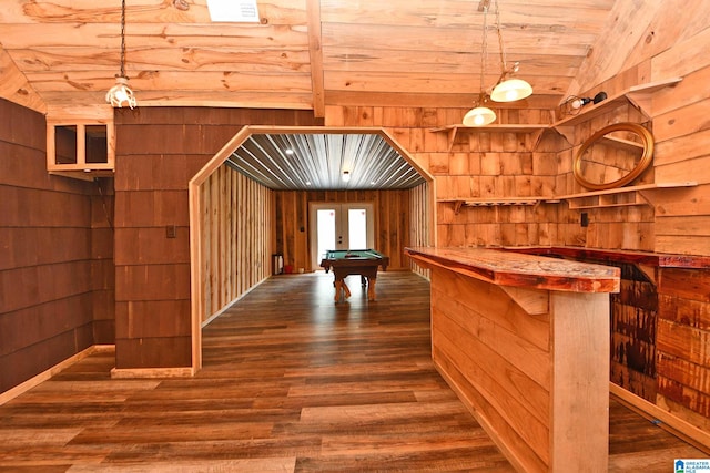 interior space with billiards, wooden walls, wooden ceiling, and wood-type flooring