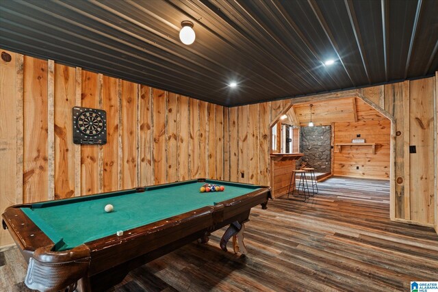 bathroom with a tile shower, toilet, vanity, hardwood / wood-style flooring, and a textured ceiling