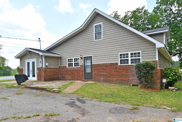 view of home's exterior featuring french doors