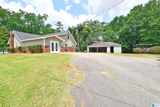 ranch-style house with a front lawn