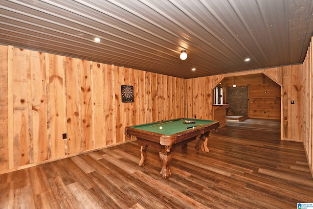 game room with hardwood / wood-style floors, pool table, and wooden walls