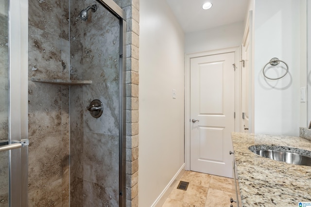 bathroom with tile patterned flooring and an enclosed shower