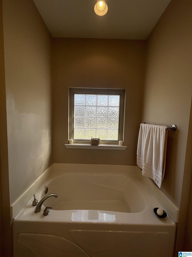 full bath with a garden tub