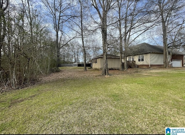 view of yard with an attached garage