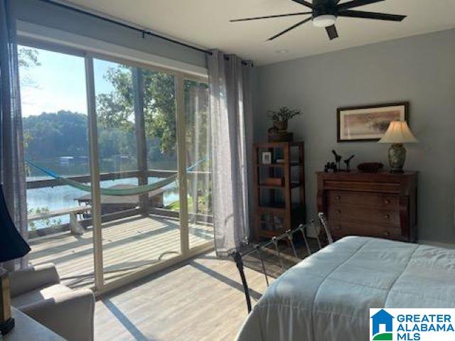 bedroom featuring ceiling fan and hardwood / wood-style floors