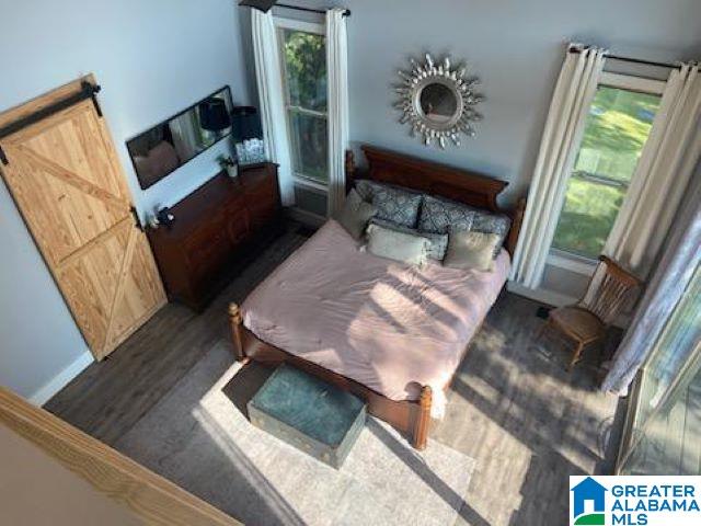 sitting room with hardwood / wood-style flooring