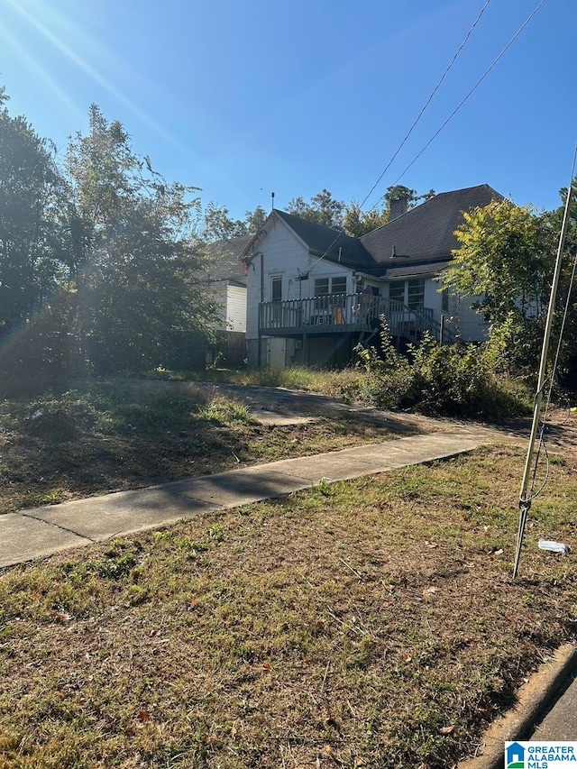 view of yard with a deck