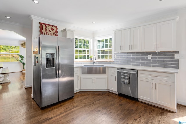 kitchen featuring white cabinetry, stainless steel appliances, sink, and dark hardwood / wood-style floors