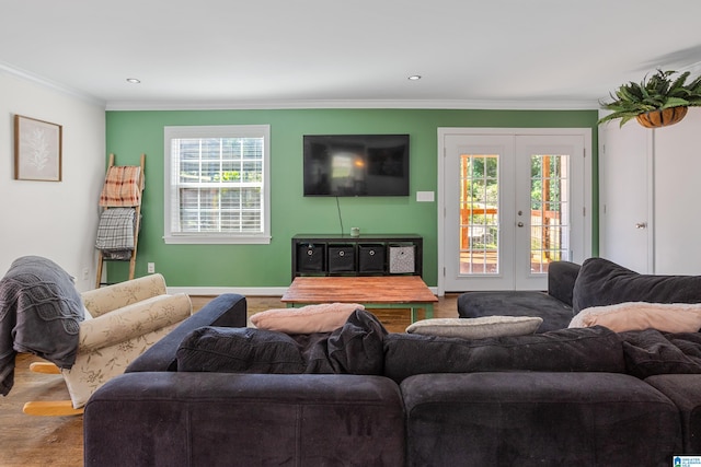 living room featuring ornamental molding, french doors, and wood-type flooring