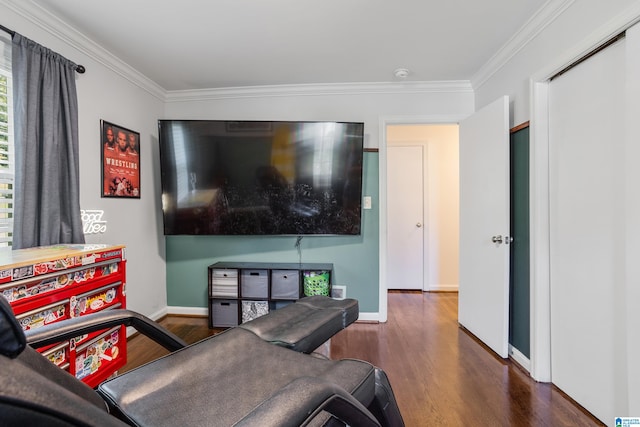 living room featuring crown molding and dark hardwood / wood-style floors