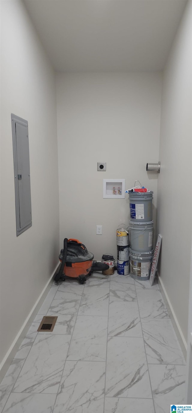 laundry room featuring hookup for a washing machine, electric panel, and hookup for an electric dryer