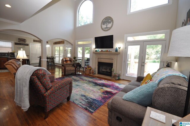 sunroom featuring a wealth of natural light and ceiling fan