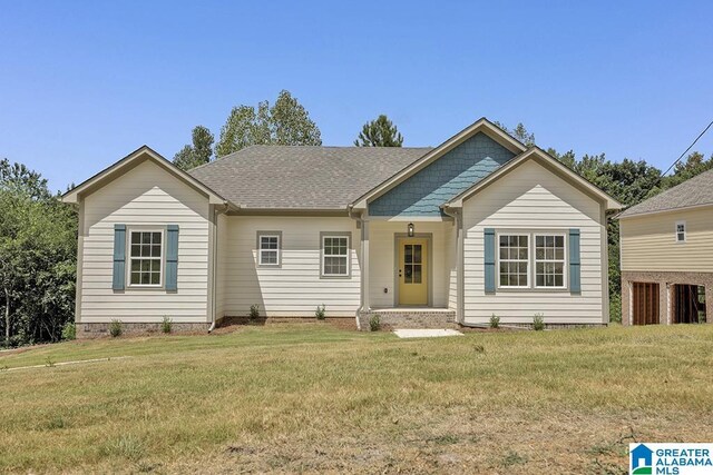 view of front of home with a front lawn