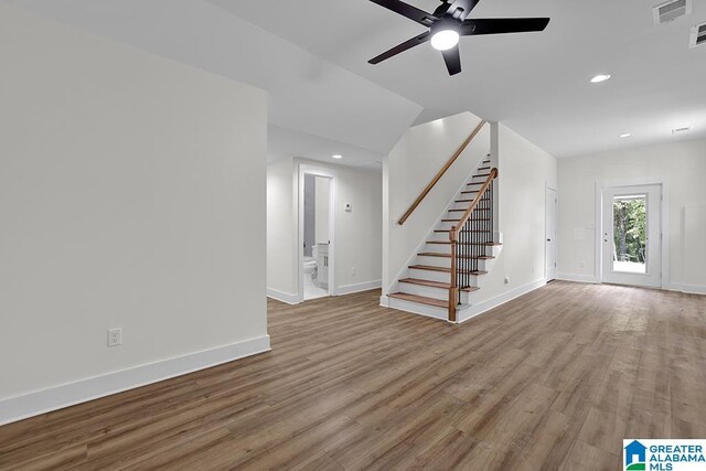 interior space with ceiling fan and hardwood / wood-style floors