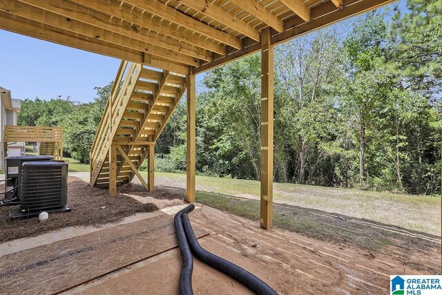 view of patio with a deck and central AC