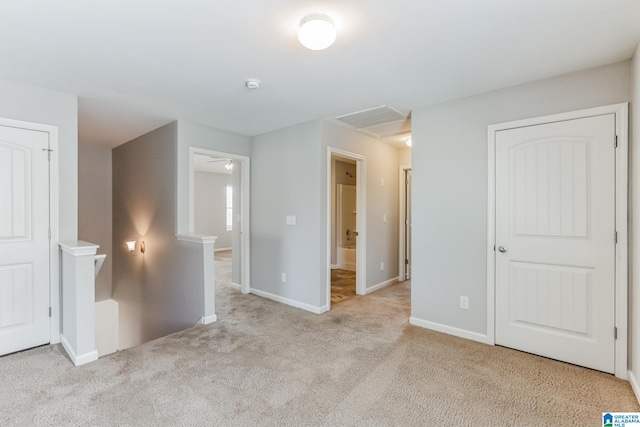 empty room with light colored carpet