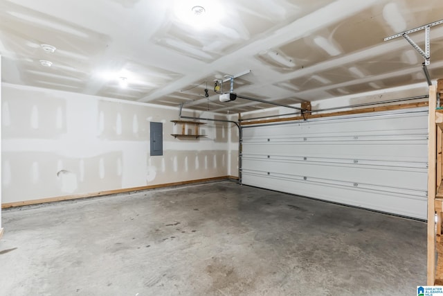 garage with a garage door opener and electric panel