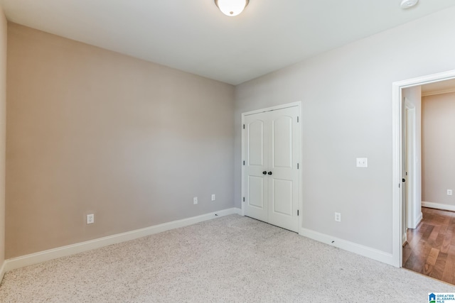 unfurnished bedroom featuring hardwood / wood-style floors