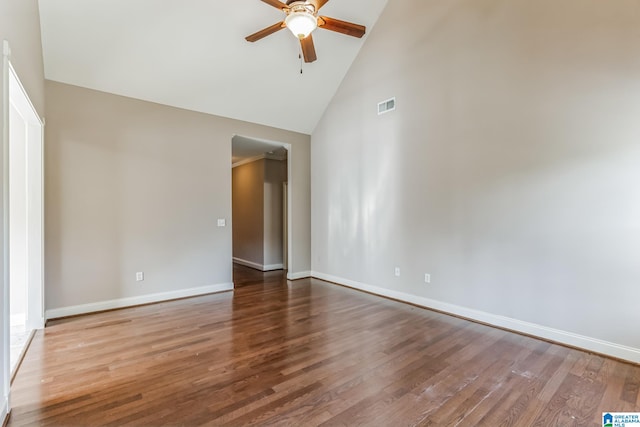 unfurnished room with hardwood / wood-style flooring, high vaulted ceiling, and ceiling fan