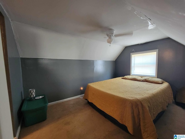 bedroom with carpet, vaulted ceiling, and ceiling fan