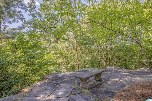 7105 Valderrama Cir, Vestavia Hills, AL 35242 - view of patio / terrace featuring a forest view