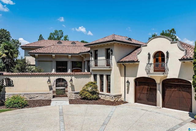 mediterranean / spanish home featuring a balcony