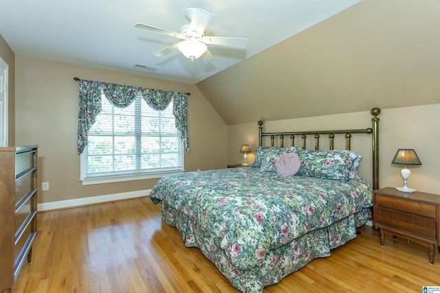 171 Sheeps Xing, Calera, AL 35040 - bedroom featuring baseboards, visible vents, a ceiling fan, wood finished floors, and vaulted ceiling
