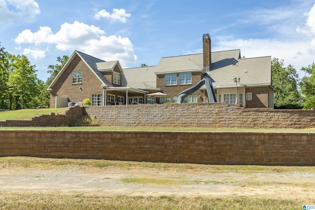 171 Sheeps Xing, Calera, AL 35040 - back of house with a chimney