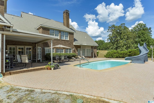 171 Sheeps Xing, Calera, AL 35040 - pool with a patio and a water slide